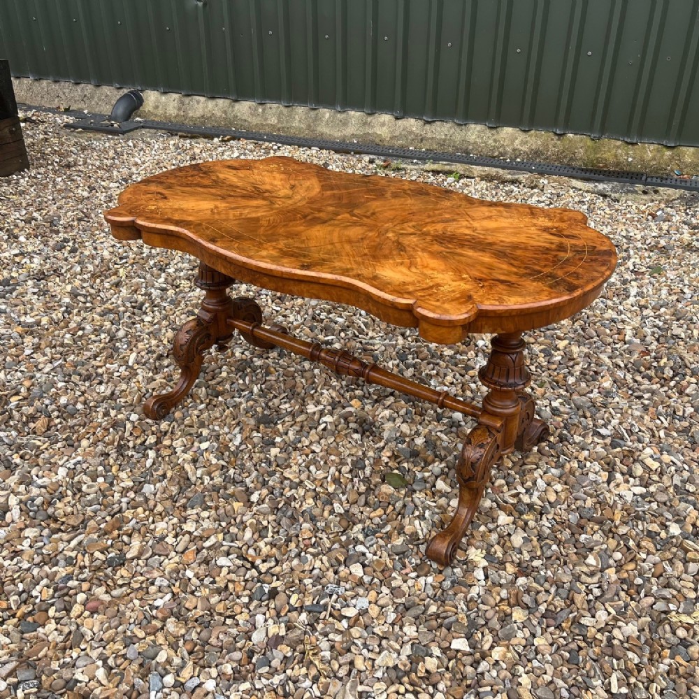 A Victorian Period burr walnut coffee table