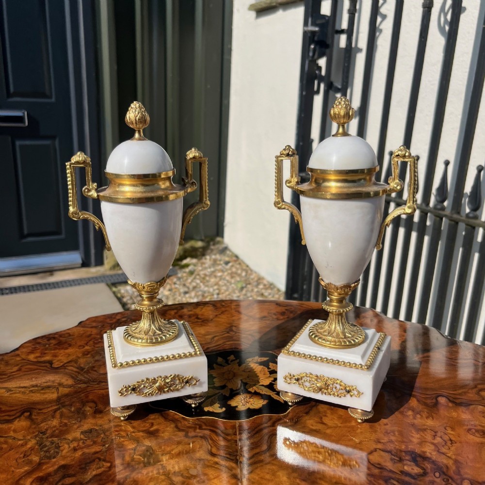 A pair of Late 19th Century French marble and ormolu urns.