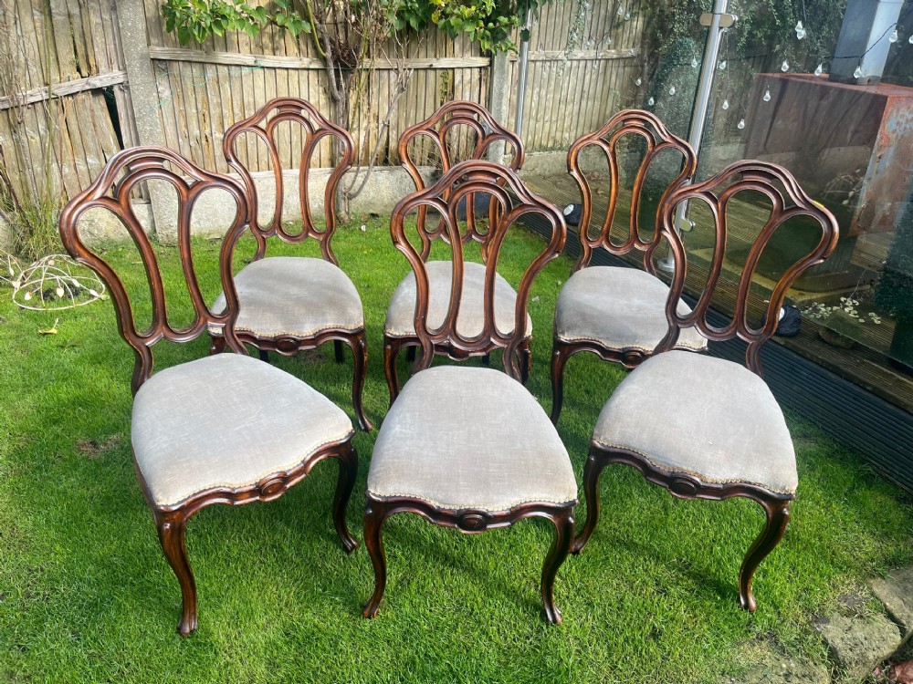 A good set of 6 Victorian Period walnut cabriole leg dining chairs