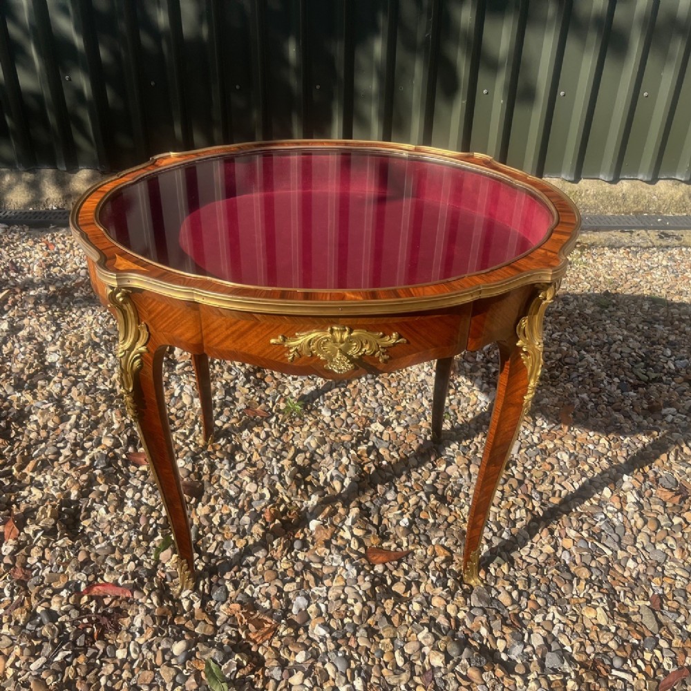 A fine quality French kingwood and ormolu mounted bijouterie cabinet