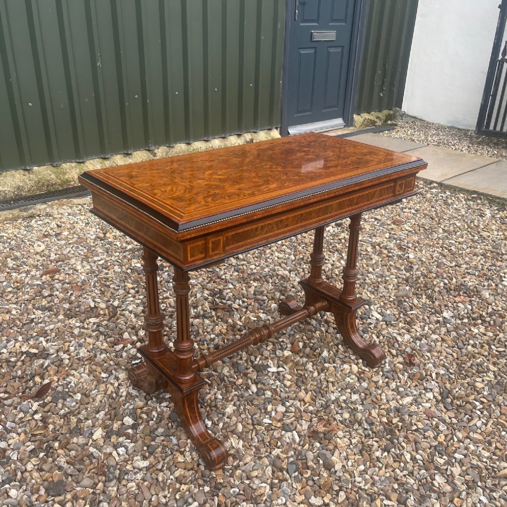 A stunning quality burr walnut Victorian Period fold over card table by Gillows of Lancaster