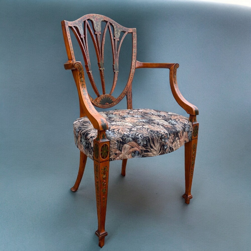 A fine quality Sheraton revival painted satinwood armchair