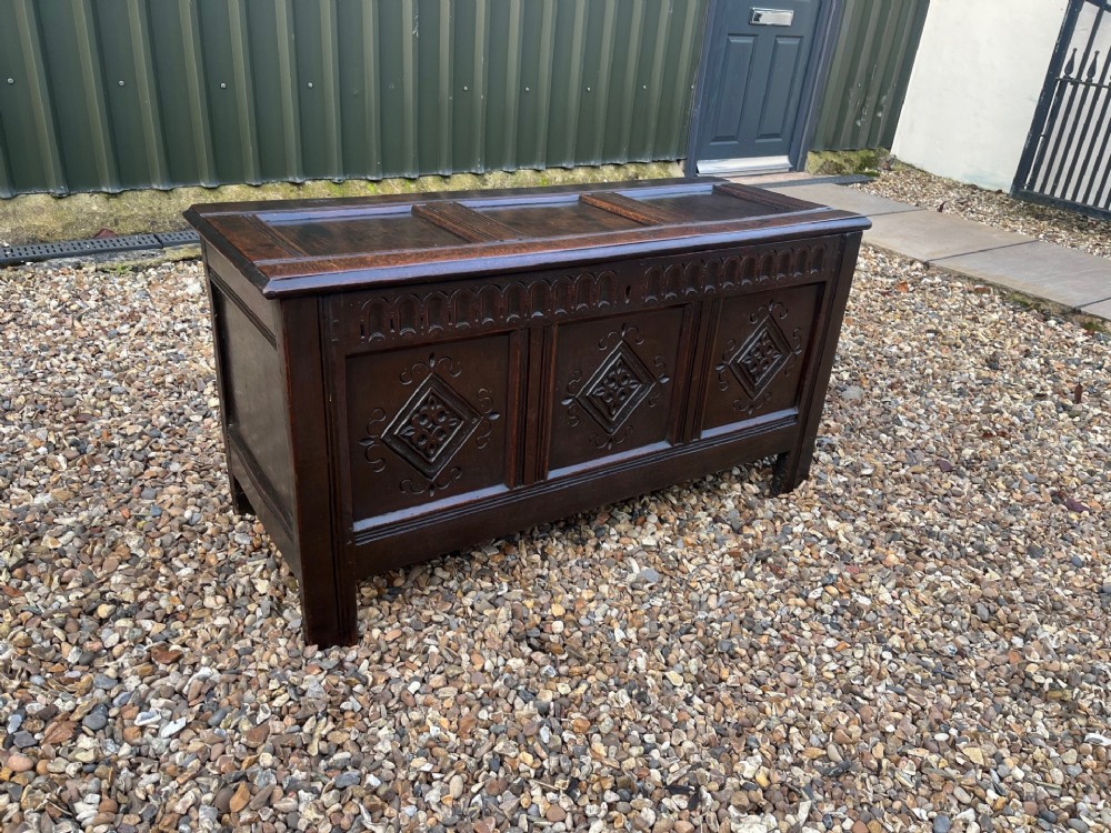 A late 17th Century oak three panel antique coffer