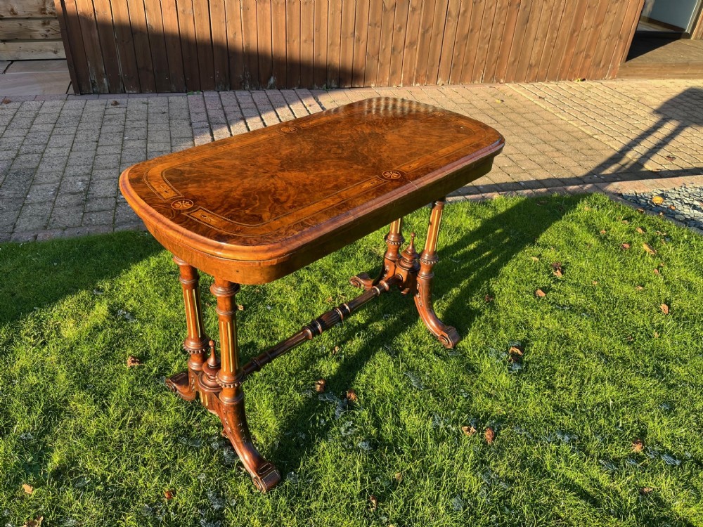 A fine quality Victorian Period burr walnut fold over games table