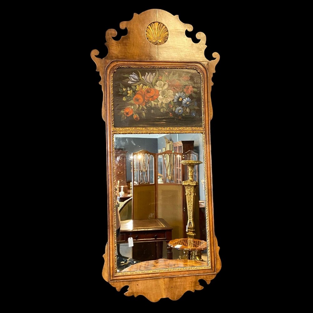 A Queen Anne Revival walnut wall mirror