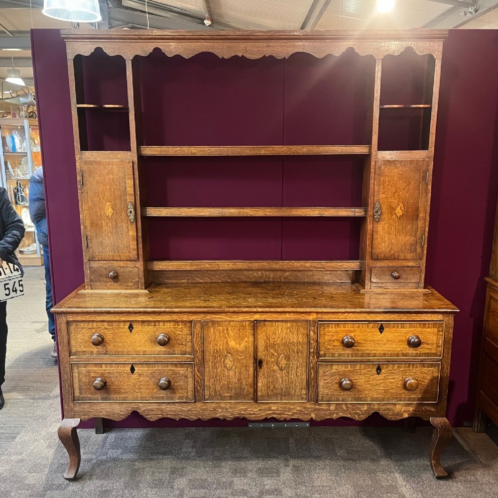 An Early 19th Century Shropshire oak dresser and rack.