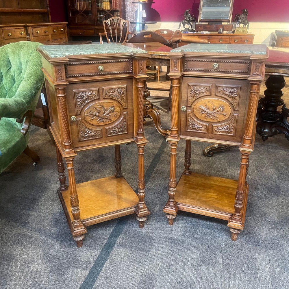 A pair of fine quality French walnut bedside cabinets
