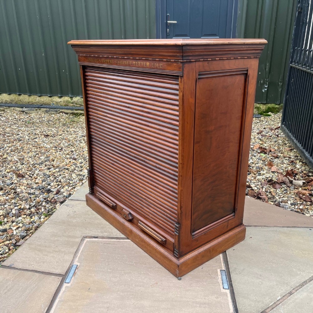 An Edwardian Period Amberg's walnut filing cabinet
