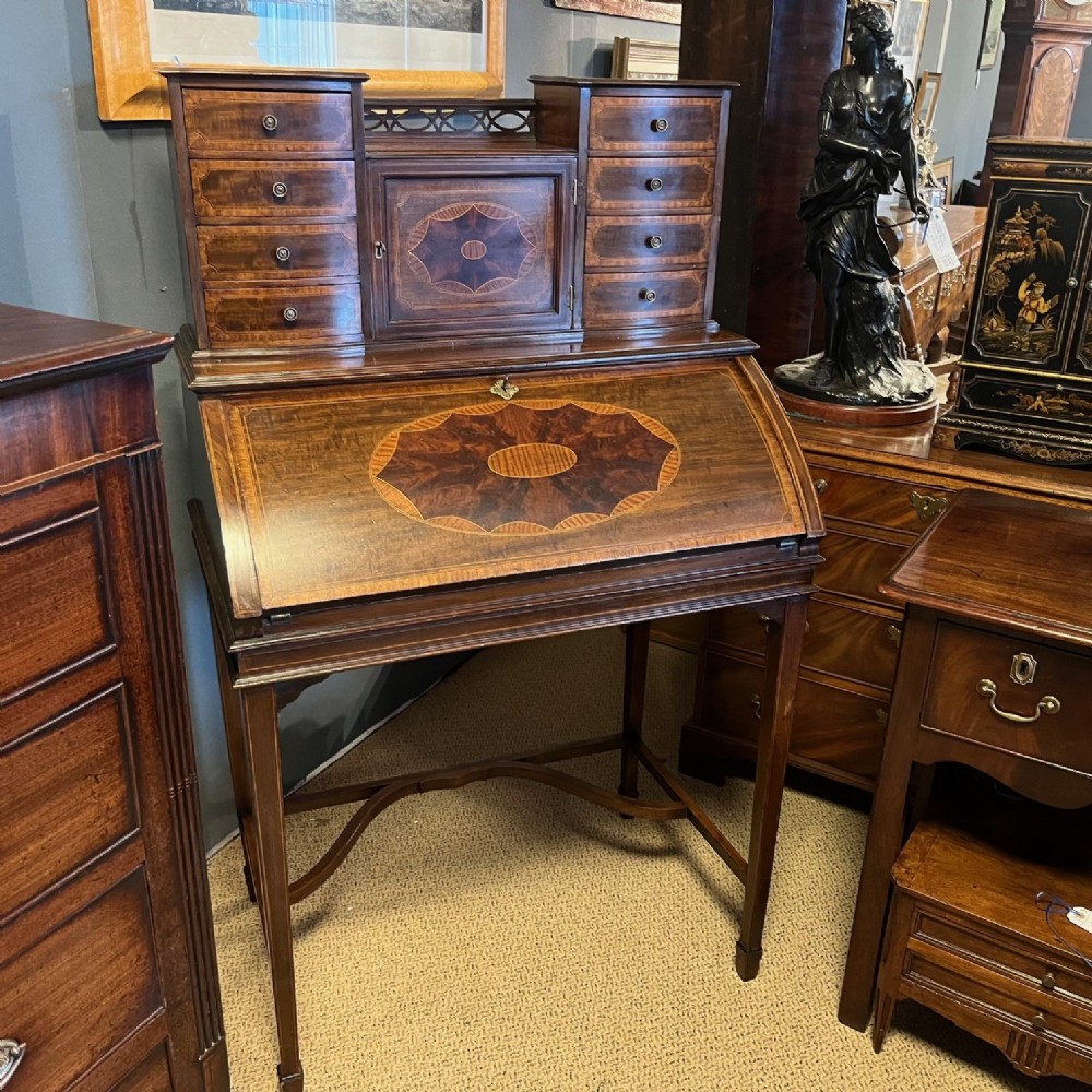 An Edwardian Period mahogany and satinwood ladies writing desk