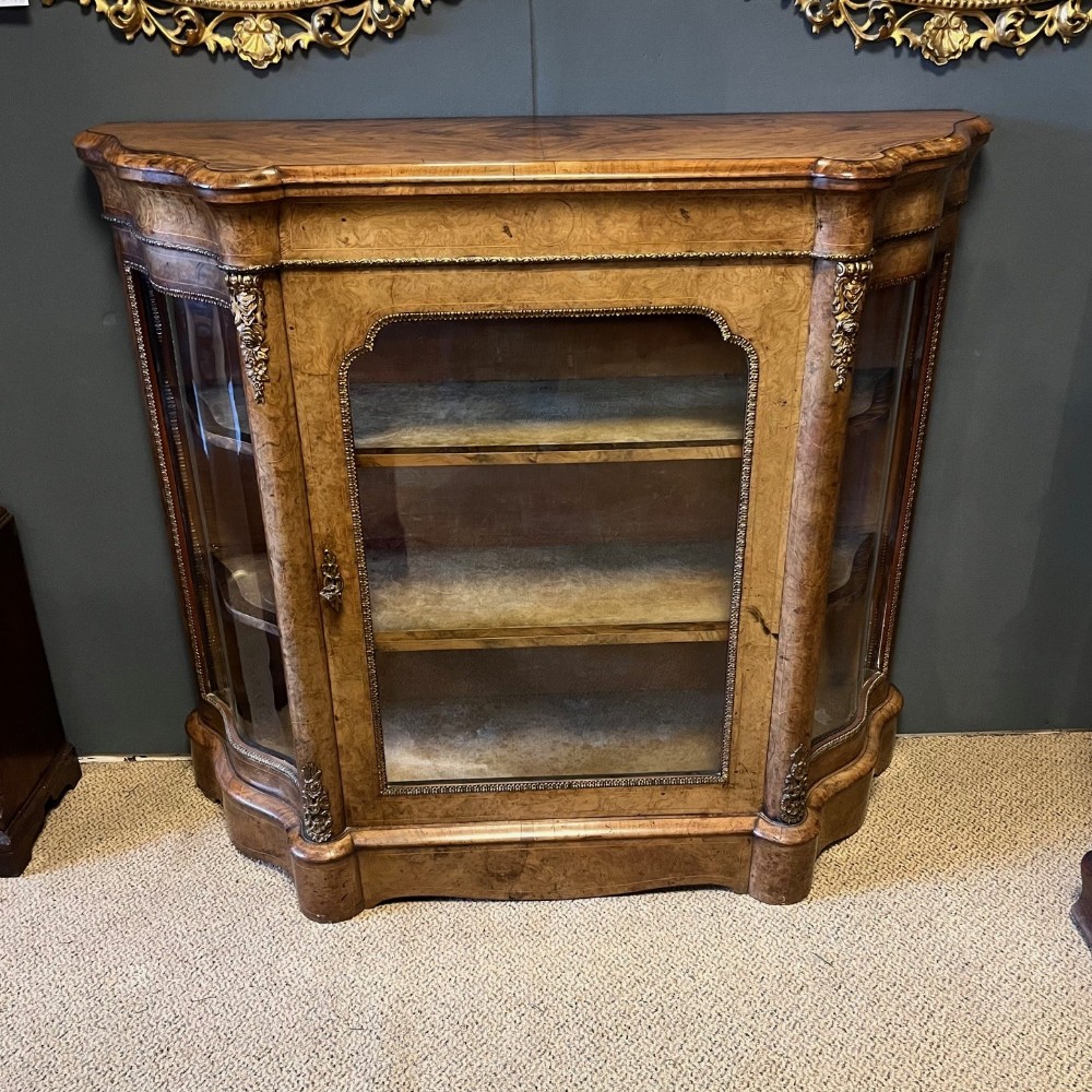 A Victorian Period burr walnut serpentine side cabinet