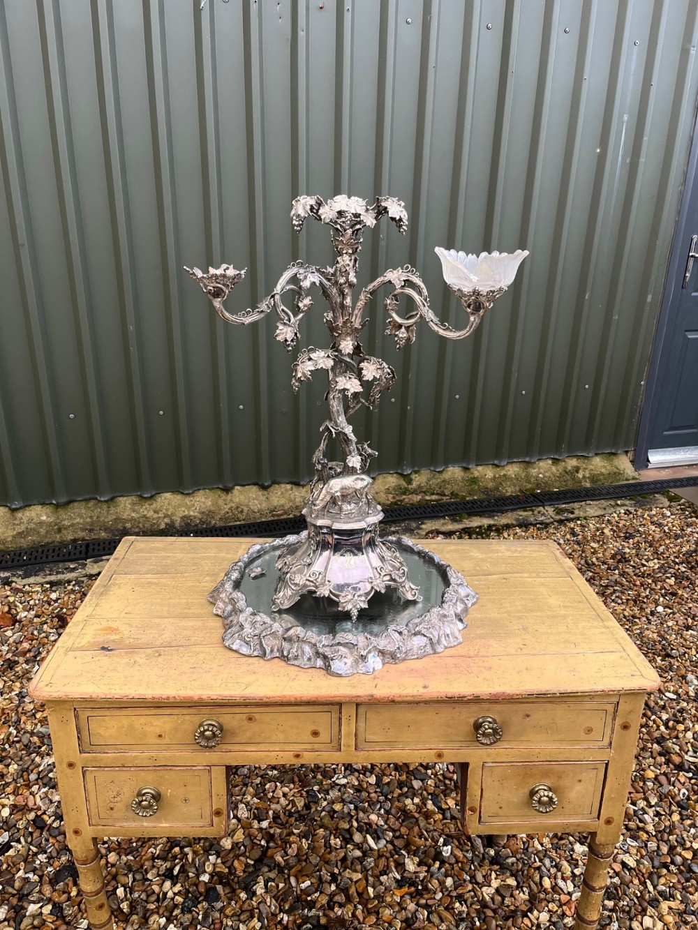 A large scale silver plated table centre piece by Elkington & Sons.