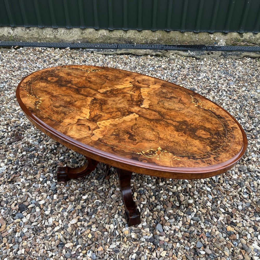 A beautiful Victorian Period oval burr walnut coffee table