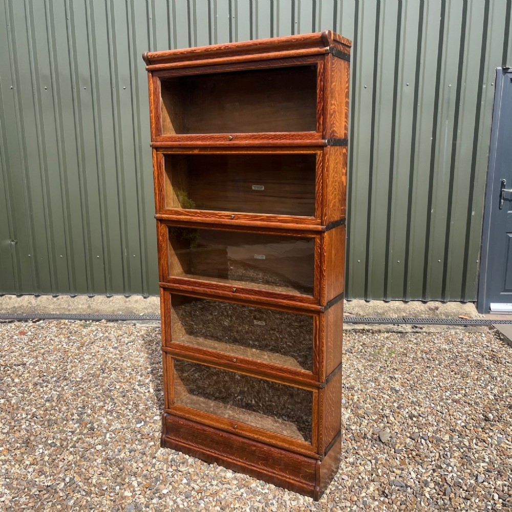 An Edwardian Period oak Globe Wernicke stacking bookcase.