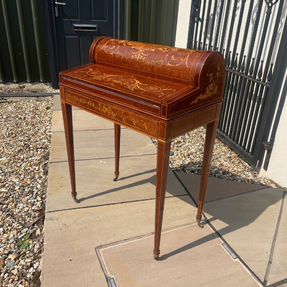 A Stunning Quality Edwards & Roberts Of London marquetry inlaid desk.