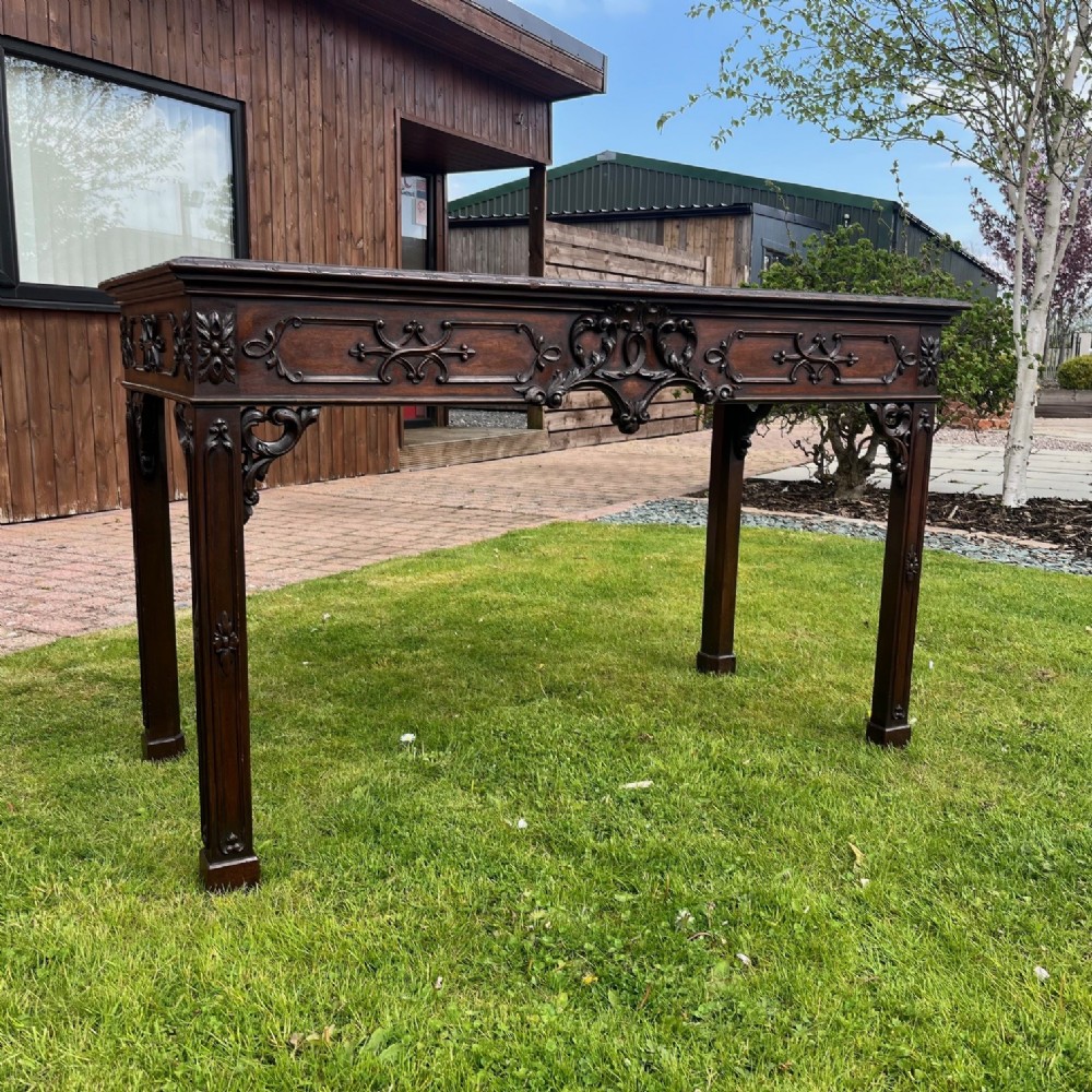 A Chinese Chippendale design mahogany console table.