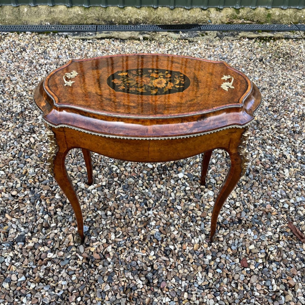 A Victorian Period burr walnut oval planter.