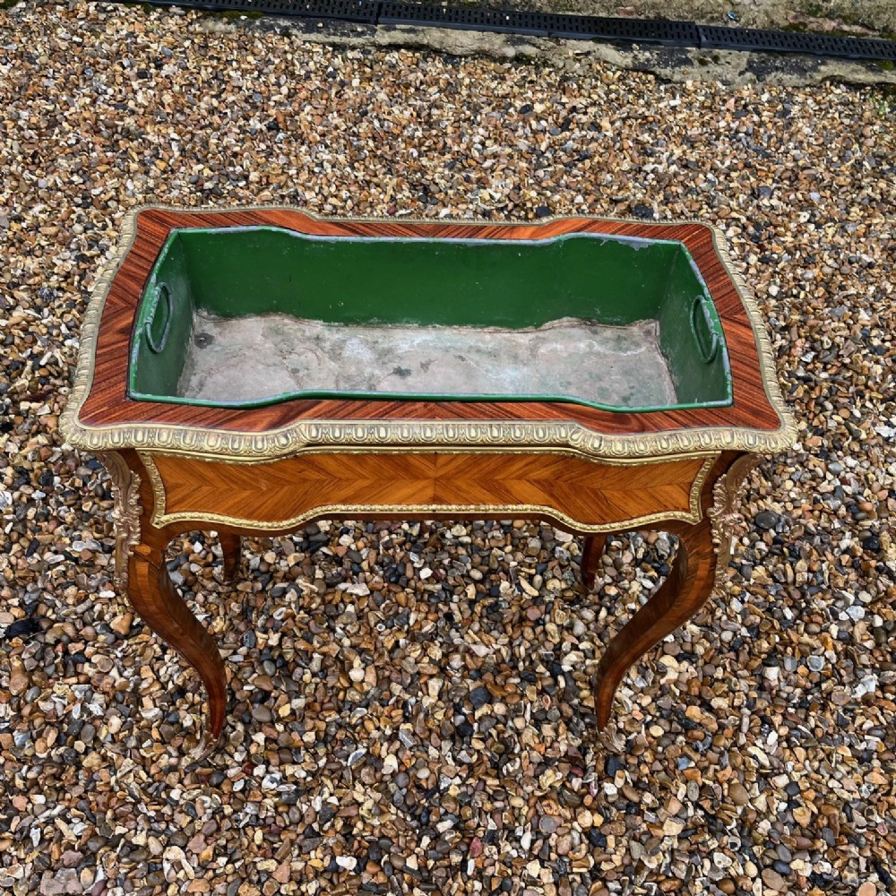 A Late 19th Century French kingwood, rosewood and ormolu serpentine planter