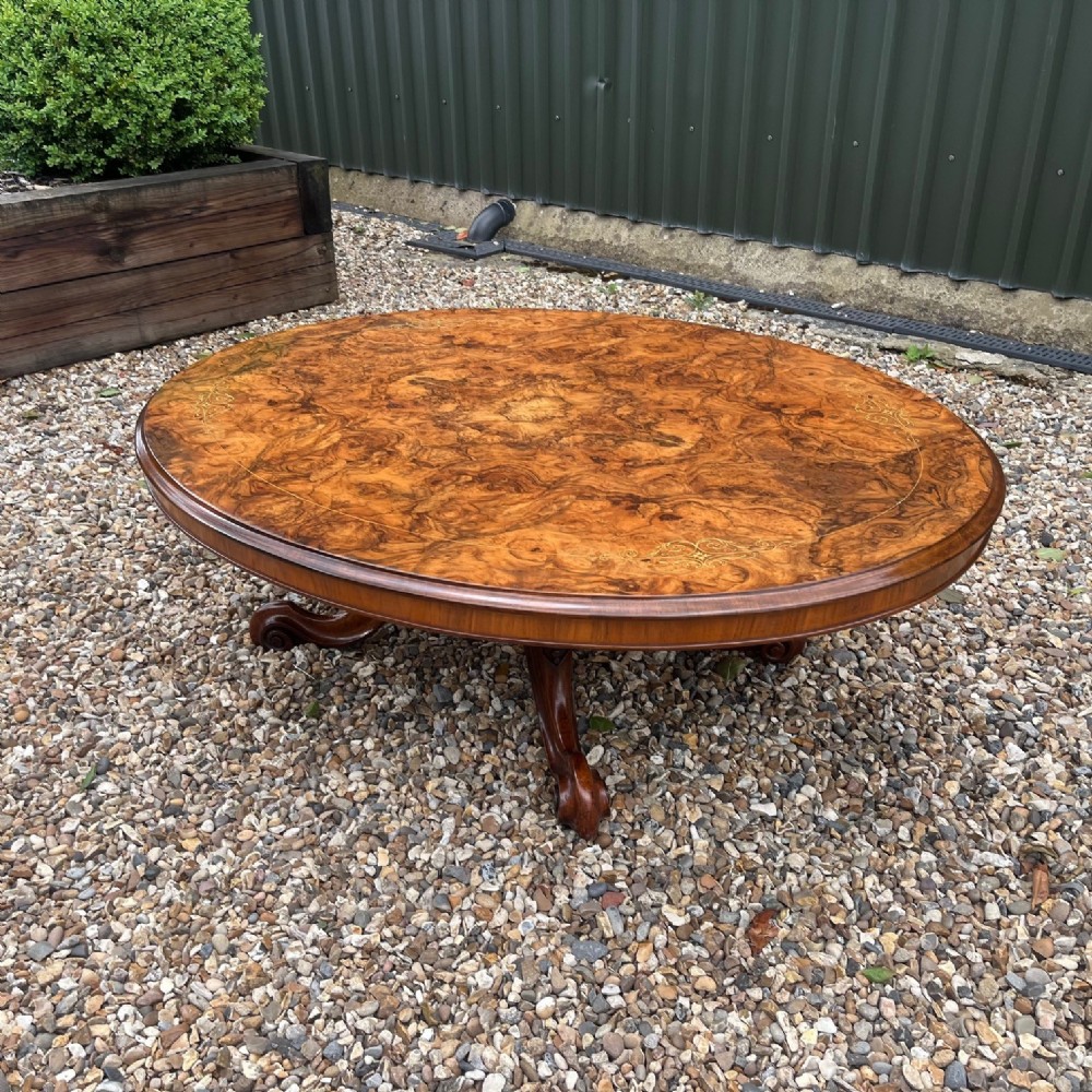 A Victorian Period burr walnut and marquetry inlaid coffee table