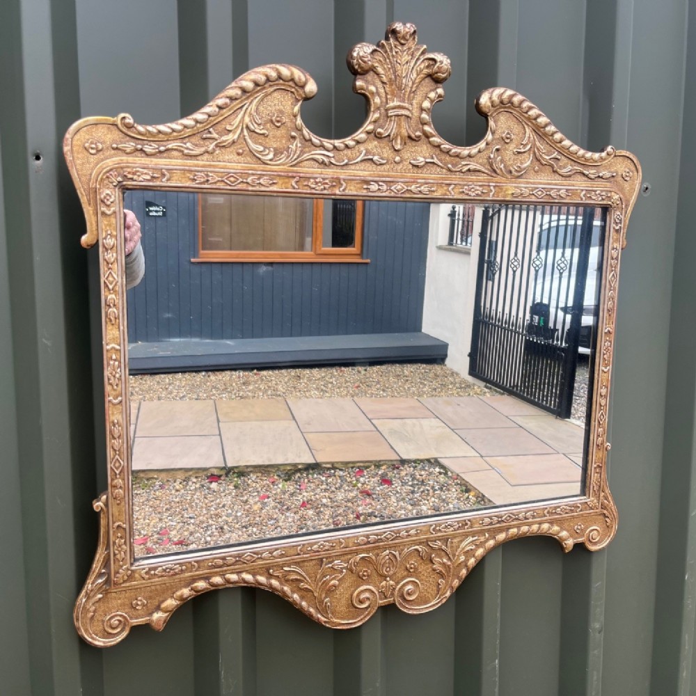 George III Style carved gilt wood and gesso mirror