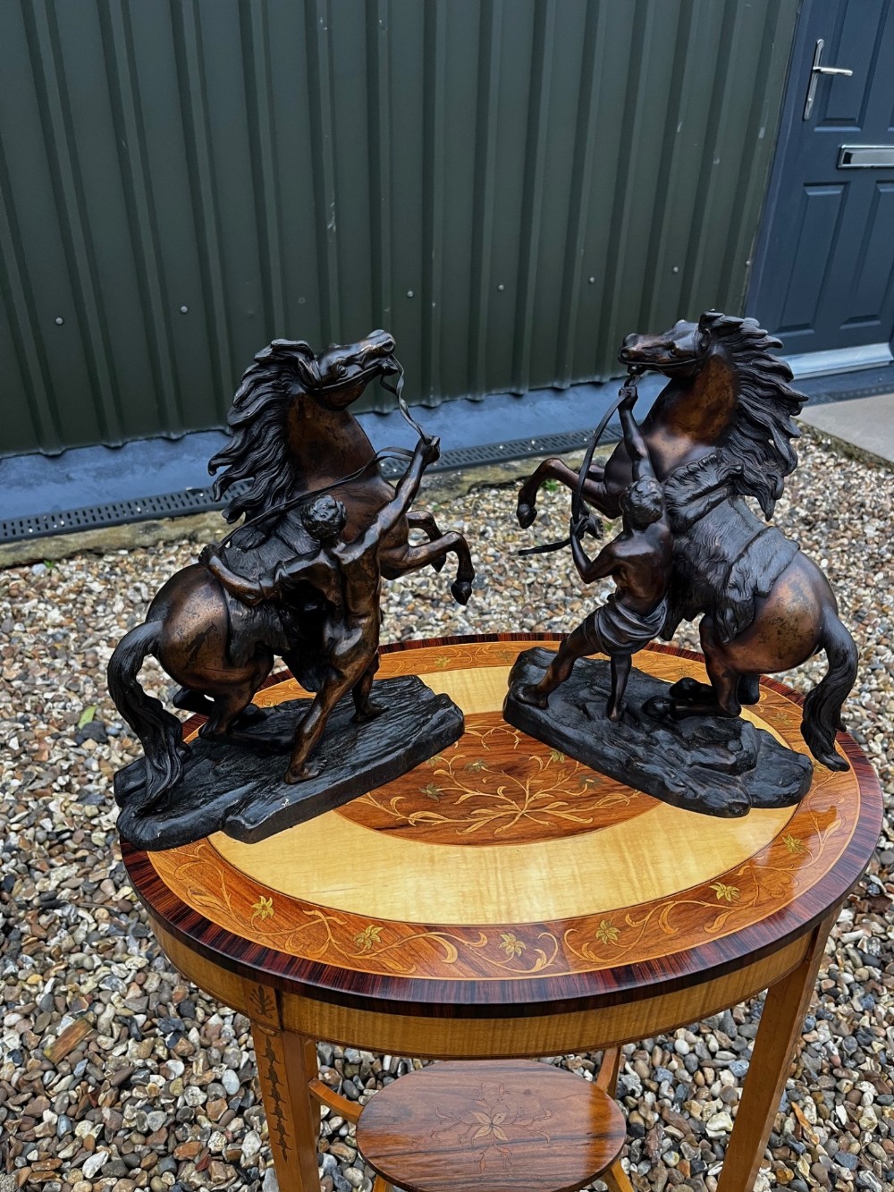 A pair of French Classical 19th Century bronze Marley horses