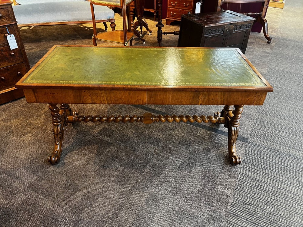 A victorian Period Walnut Leather Topped Coffee Table