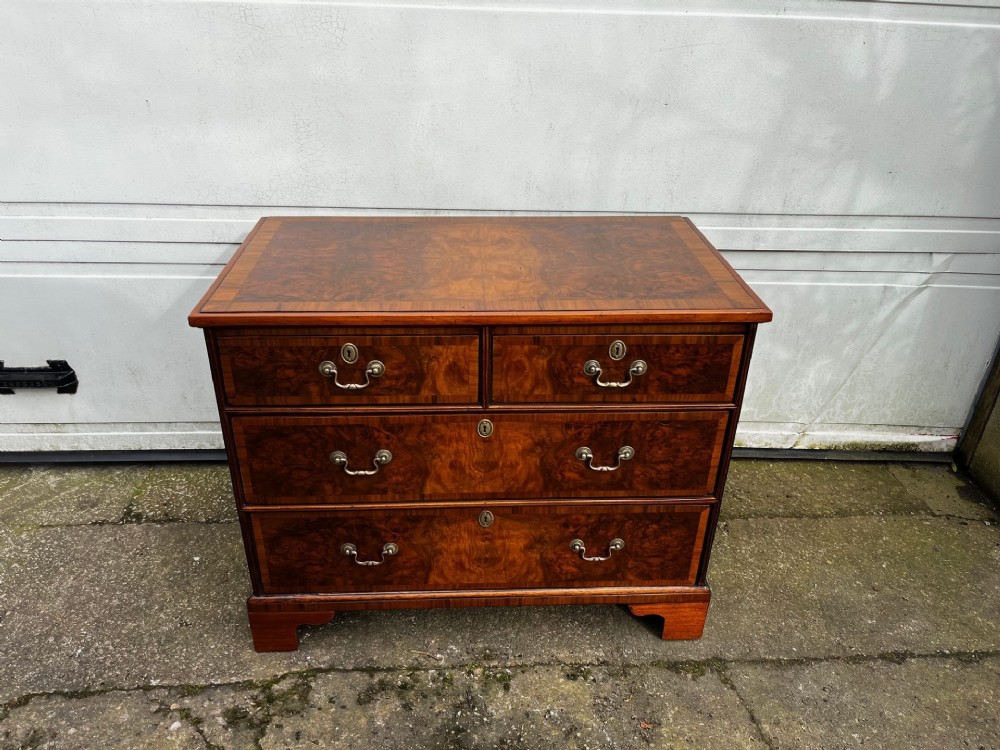 A Small 19th Century Burr Walnut Veneered Chest Of Drawers View II