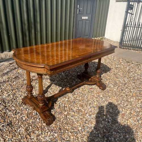 A stunning quality Victorian Period burr walnut and ormolu mounted library table