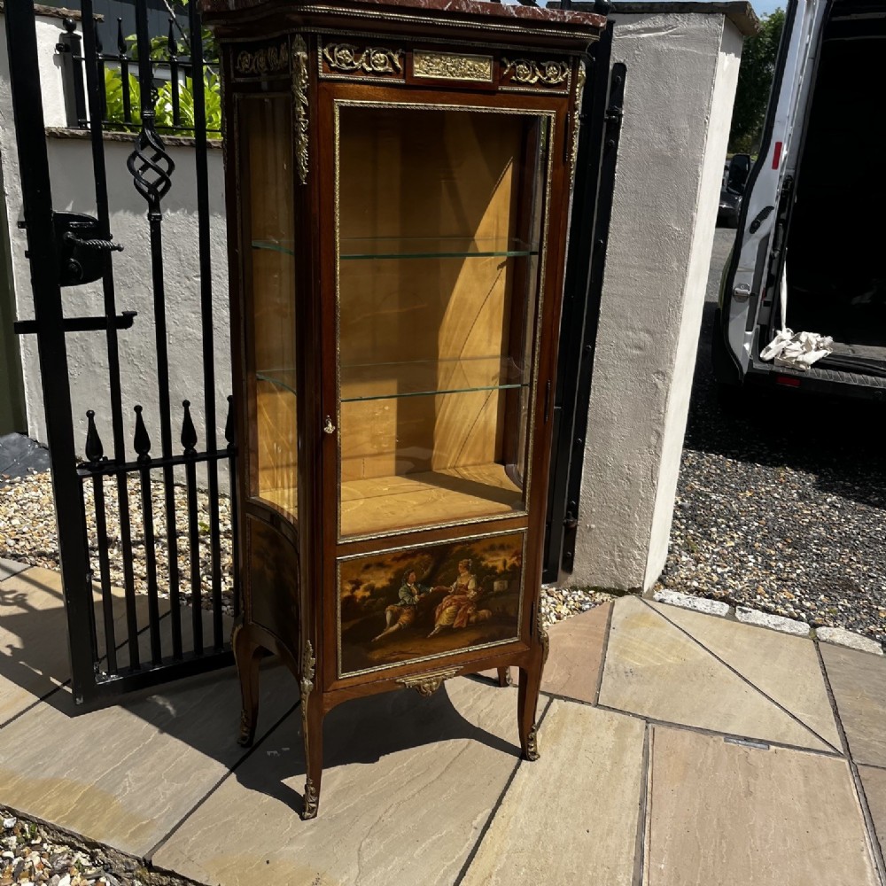 A French Louis XV style mahogany display cabinet featuring glazed sides, gilt bronze mounts, a marble top, and a lower hand-painted Vernis Martin panel. View IV