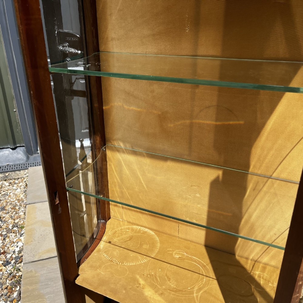 A French Louis XV style mahogany display cabinet featuring glazed sides, gilt bronze mounts, a marble top, and a lower hand-painted Vernis Martin panel. View VI