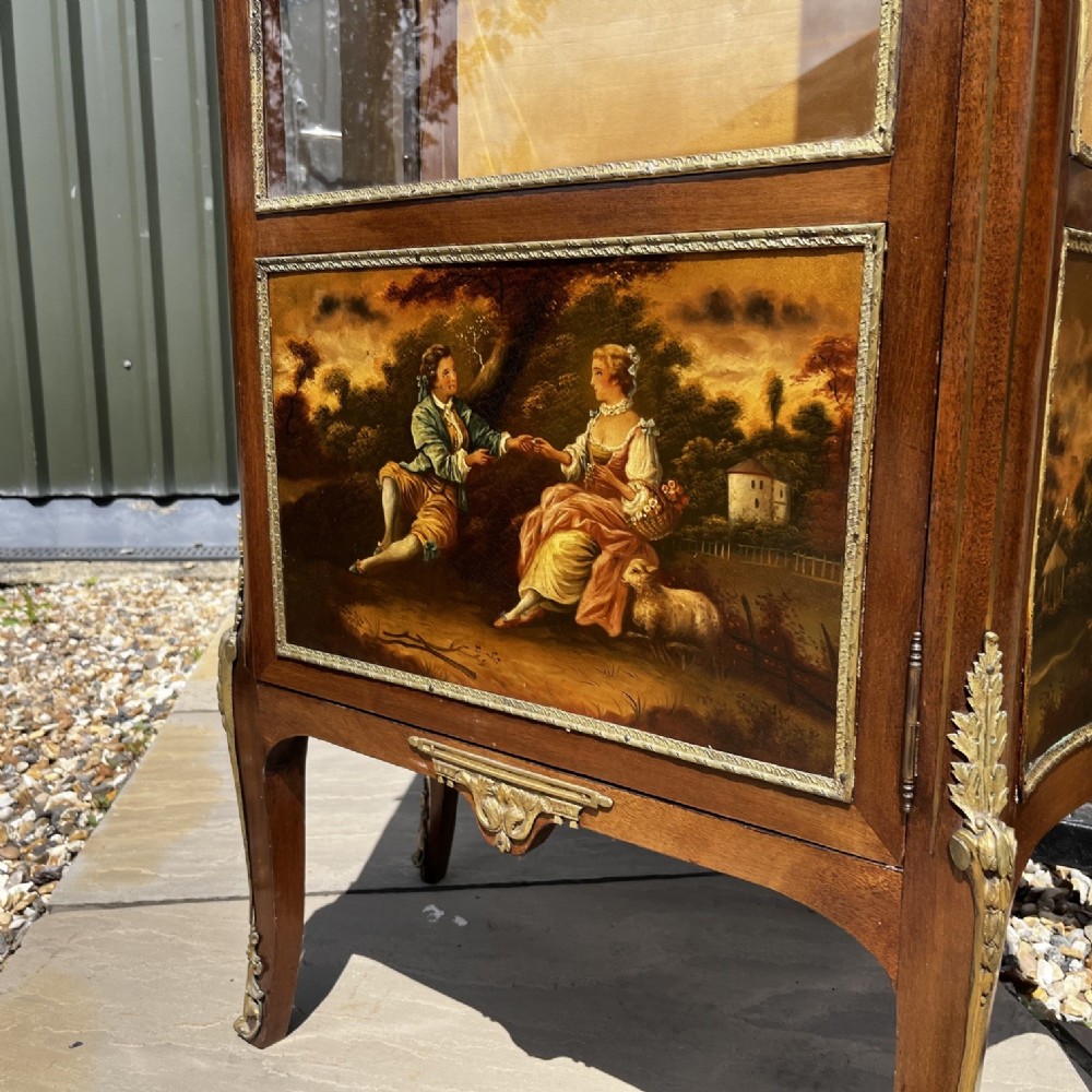 A French Louis XV style mahogany display cabinet featuring glazed sides, gilt bronze mounts, a marble top, and a lower hand-painted Vernis Martin panel. View XI