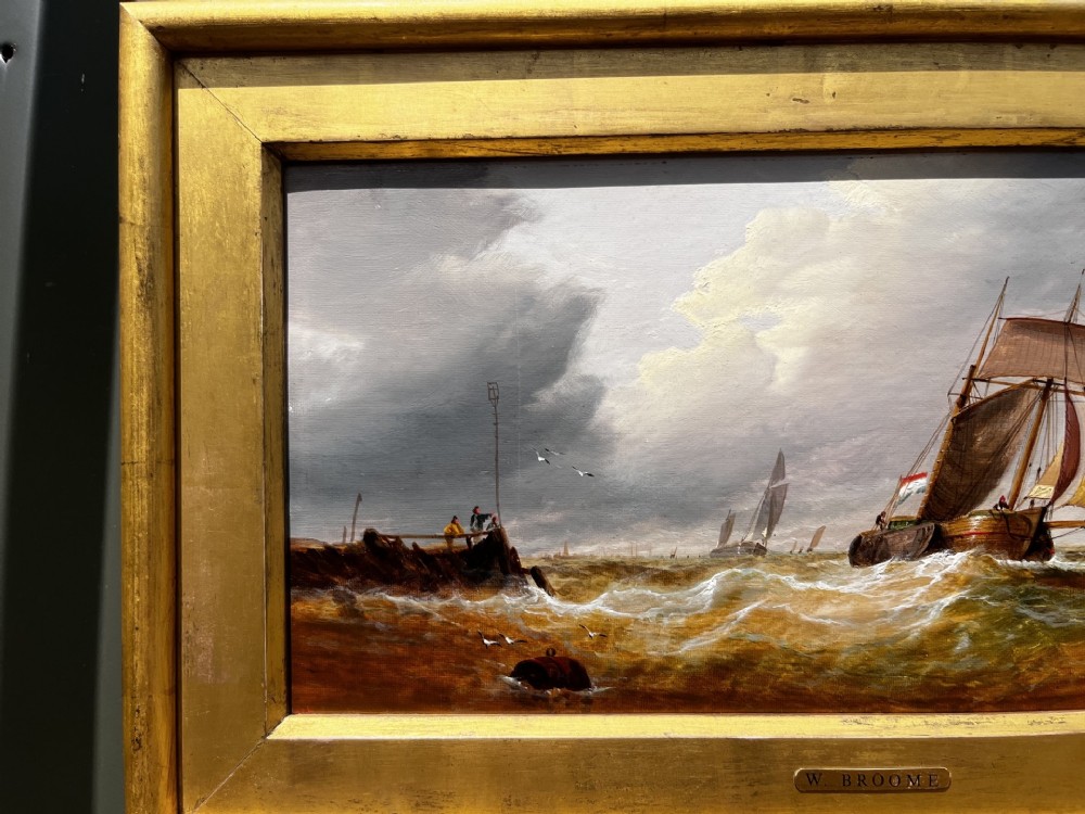 A pair of Victorian marine oil paintings depicting sailing ships on choppy coastal waters, framed in matching gilded rectangular frames with brass nameplates. View VI