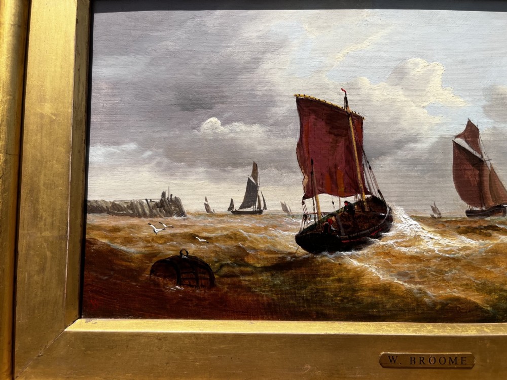 A pair of Victorian marine oil paintings depicting sailing ships on choppy coastal waters, framed in matching gilded rectangular frames with brass nameplates. View VII