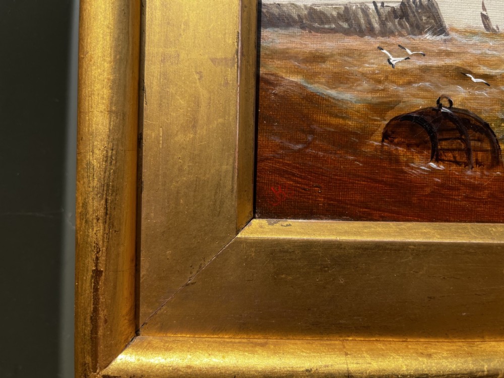 A pair of Victorian marine oil paintings depicting sailing ships on choppy coastal waters, framed in matching gilded rectangular frames with brass nameplates. View IX