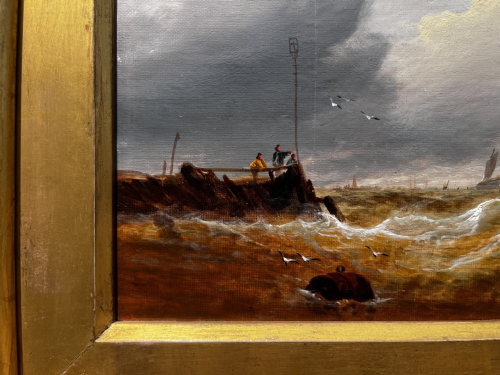 A pair of Victorian marine oil paintings depicting sailing ships on choppy coastal waters, framed in matching gilded rectangular frames with brass nameplates. View XI