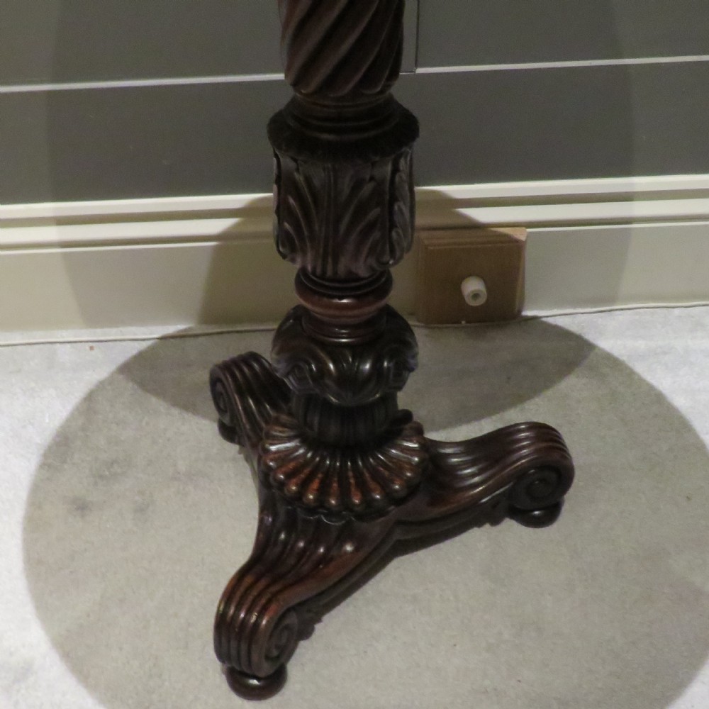 A Victorian mahogany side table featuring a circular polished top supported by a spiral-carved pedestal and a carved tripod base. View II