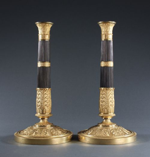 pair of patinated and gilt bronze reeded column candlesticks - CATEGORY: ANTIQUE LIGHTING - DATED 19TH CENTURY