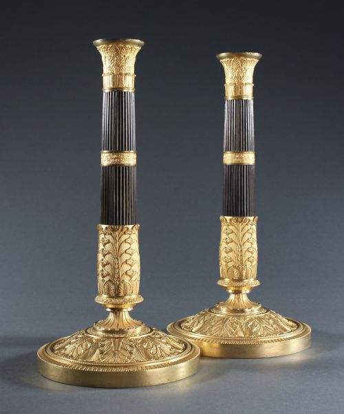 PAIR OF PATINATED AND GILT BRONZE REEDED COLUMN CANDLESTICKS - ADDITIONAL PHOTO 1