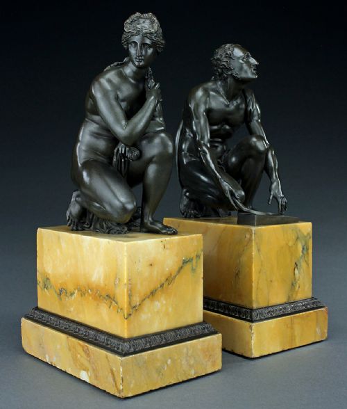 PAIR OF VENUS AND ARROTINO BRONZES ON SIENA MARBLE