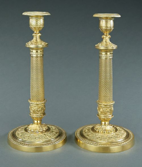 Pair of French Empire Gilt Bronze Candlesticks