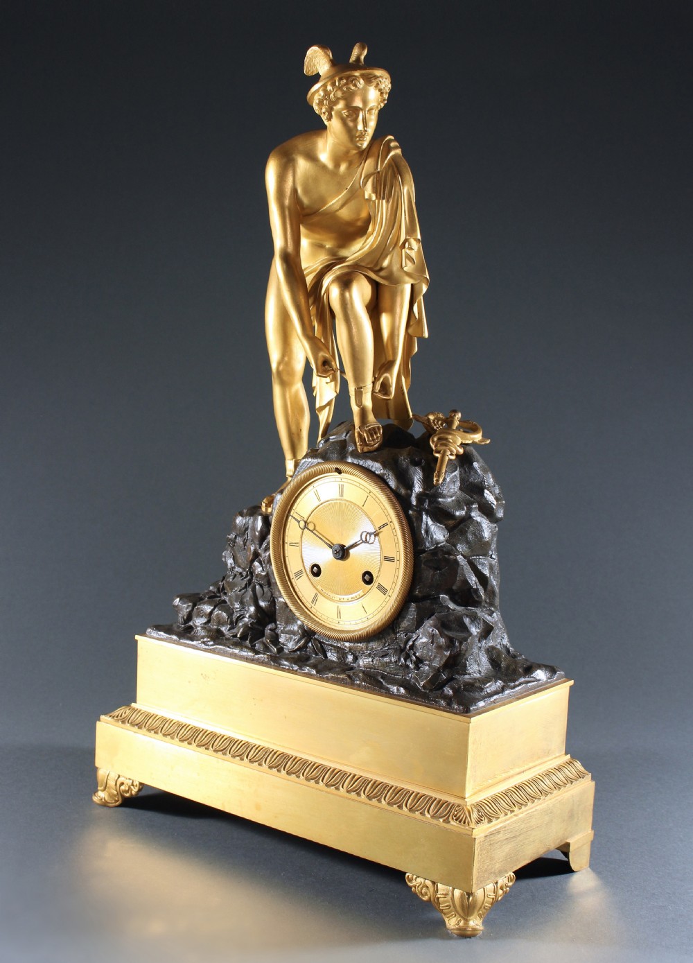French Empire gilt and patinated bronze Hermes clock