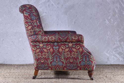 A DEEP SEATED HOWARD STYLE ARMCHAIR - ADDITIONAL PHOTO 4