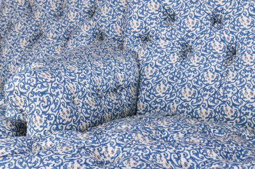 PAIR OF HOWARD SONS DEEPBUTTONED ARMCHAIRS - ADDITIONAL PHOTO 1