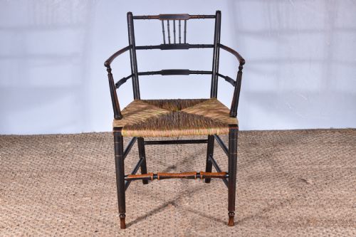 A SUSSEX ARMCHAIR - ADDITIONAL PHOTO 1