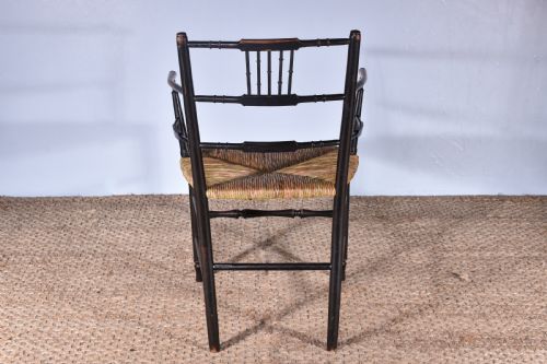 A SUSSEX ARMCHAIR - ADDITIONAL PHOTO 3