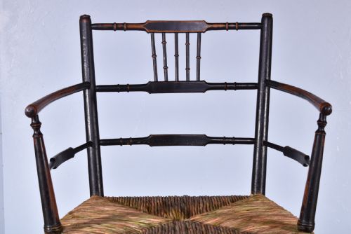 A SUSSEX ARMCHAIR - ADDITIONAL PHOTO 4