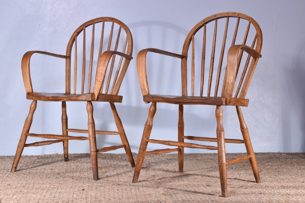 A Pair Of Applied Bent Arm Windsor Armchairs