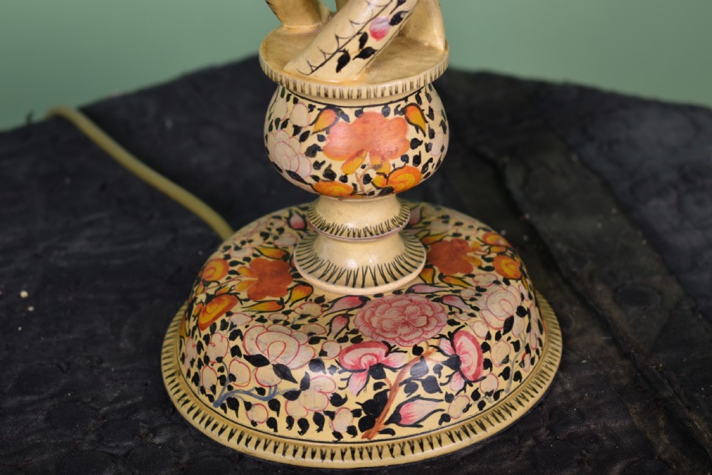A Kashmiri hand-painted table lamp with an openwork twist floral column base and a pleated olive green shade. View II