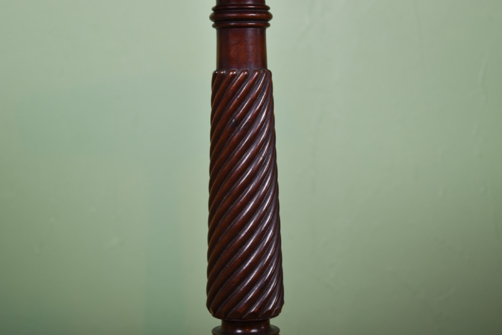 A William IV mahogany side table with a painted hexagonal top, spiral-carved central column, and a triform scroll-foot base. View III