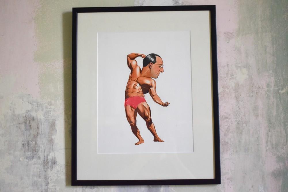 A framed watercolour cartoon depicting a bodybuilder in red trunks flexing his muscles with a caricatured male head.