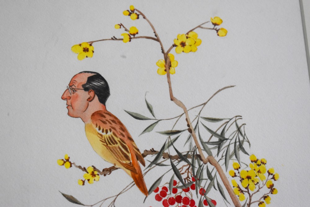 A framed watercolour artwork featuring a bird with a mans face perched on a botanical branch with yellow flowers and red berries, set within a cream mount and black frame. View II
